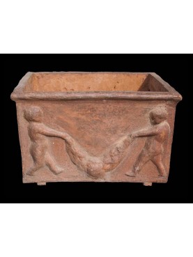 Terracotta pot with feet
