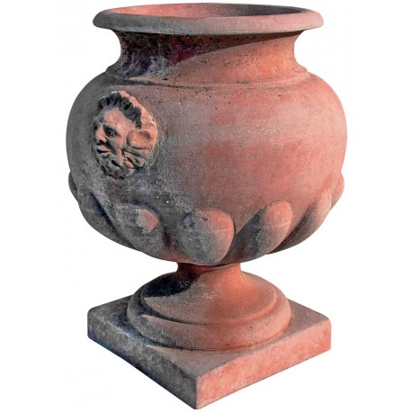 Globular vase with masks