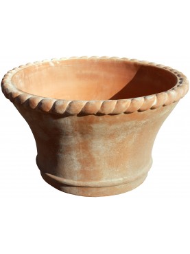 Large terracotta flower pot with twisted edge