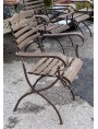 Ancient armchairs in wood and wrought iron