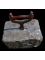 castiron boot scraper mounted on stone