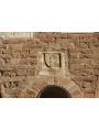 L'originale sul palazzo dei Priori di Buonconvento (Siena)