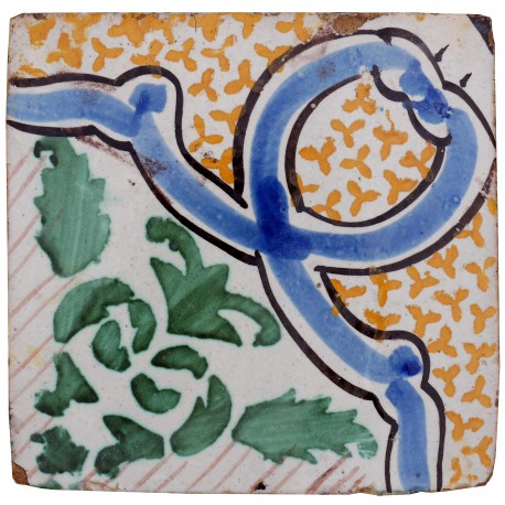 Old Majolica Tile with green leaves and blue knot