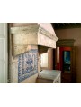 Limestone fireplace with Portuguese maiolica panel