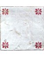 Majolica italian tile with four red flowers