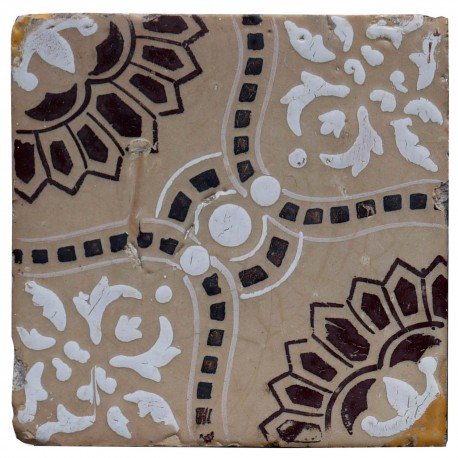 Majolica tile with brown and white design