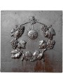Cast iron fireback with sun Sun and clusters of grape