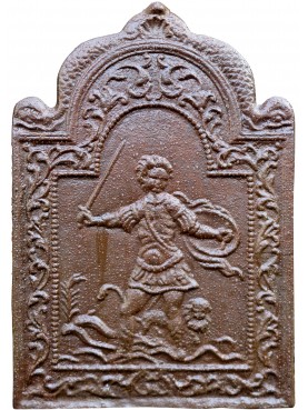 Cast iron fireback with armed warrior