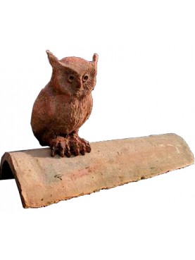 The owl on an ancient roof tile