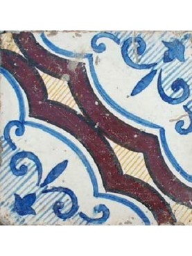 Antica piastrella di maiolica blu e manganese
