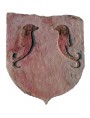 Sand stone coat of arms with dolphins