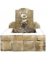 Stone fountain with dolphin