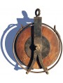 Huge wooden and iron pulley