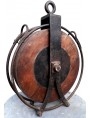 Huge wooden and iron pulley