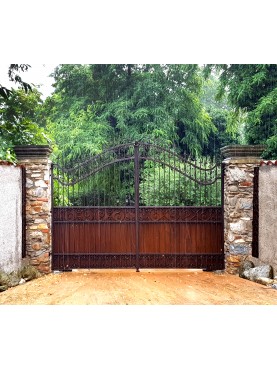 Wrought iron gate 4 m. on a rainy day