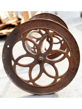 ancient pair of cast iron wheels