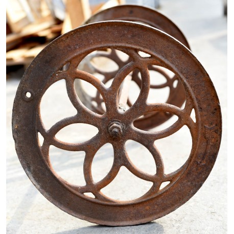 ancient pair of cast iron wheels