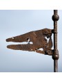 ancient Wind vane with cross and flag