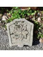 Coat of arms in stone with flower - eight-petal