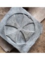 Maltese cross carved in stone
