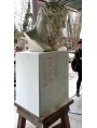 Marble block chosen for the sculpture with the plaster model on top