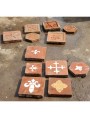Terracotta tile with Pisa cross