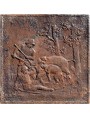 Ancient fireplace with wild boar and dogs hunting scene