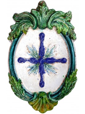 Stemma in terracotta con la croce di Avellana