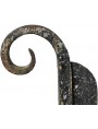 Forged-iron boot scraper mounted on stone