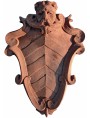 Terracotta coat of arms with satyr