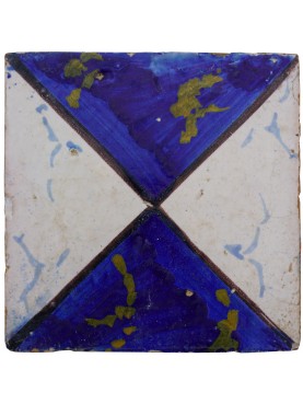 Majolica tile with blue and white hourglass pattern