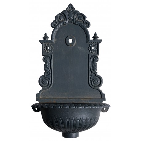 Cast iron wall fountain with scallopped basin