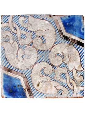 Piastrella di maiolica antica azzurra e bianca