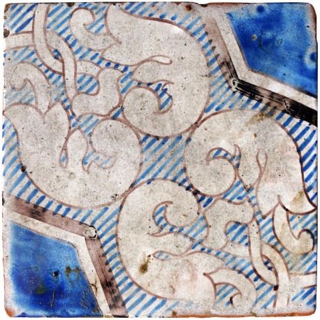 Piastrella di maiolica antica azzurra e bianca