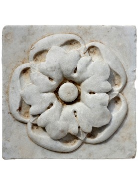 A pair of antique tiles in white Carrara marble
