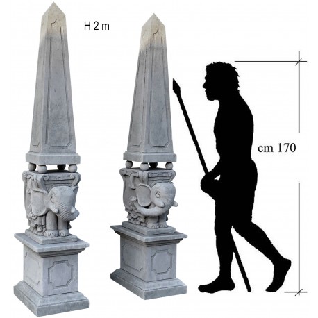 Pair of elephants on rectangular capitals with obelisks