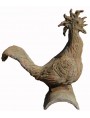 Large rooster on a roof tile