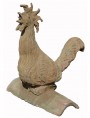 Large rooster on a roof tile