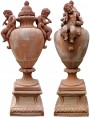 Huge baroque vases with cherubs and base