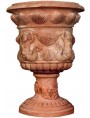 Terracotta vase with shells and two-tailed mermaids