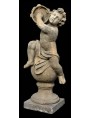 Putto on the ball with tambourines