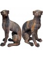 Terracotta dogs pair with dark patina