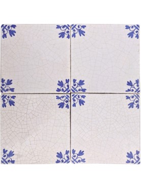 Delft tiles with small flowers on the corners