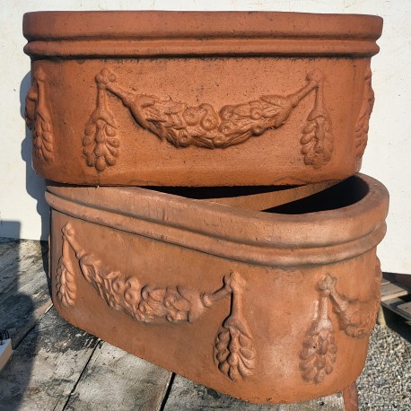 old pair of terracotta Neapolitan festooned oval boxes