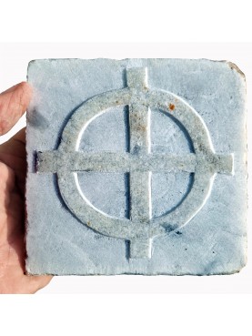 Celtic cross on ancient tile