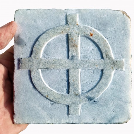 Celtic cross on ancient tile
