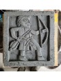 The tile freshly sculpted in raw clay