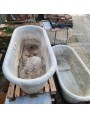 pair of ancient white Carrara marble bathtubs with rings