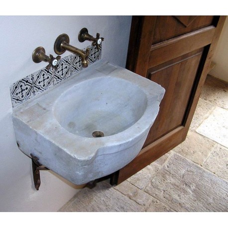 Sink, tiles and stone floor: all from salvage