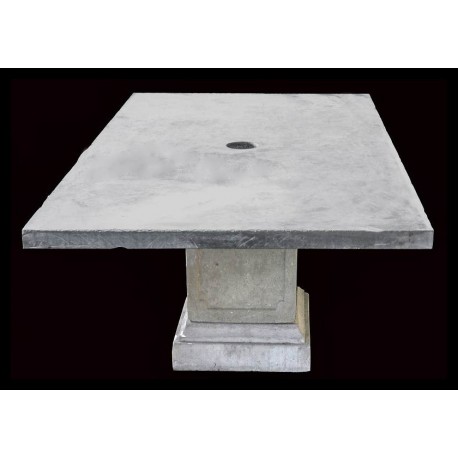 Stone and concrete table with umbrella holder hole